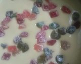 A picture of step 9 of Vanilla tutti fruity cake with Mango topping.