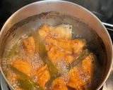 A picture of step 3 of Coca cola braised chicken wings.