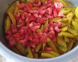 A picture of step 7 of Dry potatoe curry#cookingwith Tomatoescontest.