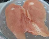 A picture of step 1 of My Steamed Chicken on a bed of Salad.