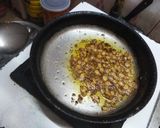 A picture of step 7 of Besan k dahi baray.