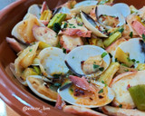 Foto del paso 7 de la receta: Wok de calçots, pota y almejas
