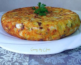 Foto del paso 14 de la receta: Tortilla de patatas con pulpo, cebolla y pimiento verde