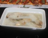 Foto del paso 7 de la receta Pan de molde con sardinas, calamares y pepinillos
