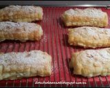 Foto del paso 9 de la receta Cañas de hojaldre rellenas de crema pastelera