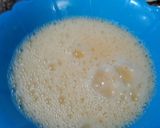 A picture of step 3 of Coconut cake with cherries.
