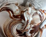 Une image de l'étape 5 de Meringues marbrées au chocolat.