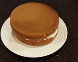 A picture of step 13 of Cinnamon Layer Cake with Cinnamon Buttercream Filling/Frosting.