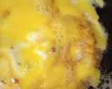 A picture of step 2 of Egg mini dosa with Schezwan chutney.