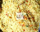 A picture of step 9 of Pineapple Fried Rice with peppered chicken and fried plantain.