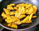 A picture of step 7 of Schezwan Potatoes /Mustang Aloo fry/Nepali Timur Aloo Masala.