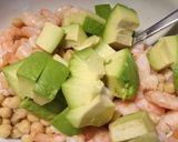 A picture of step 3 of Chickpea, avocado & prawn salad with lime, chilli and coriander.