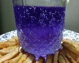 A picture of step 8 of Masala Crispy French Fries with Blue heaven Drink.