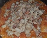 Foto del paso 4 de la receta: Arroz rojo con pollo y mariscos