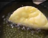A picture of step 3 of Potato stuff taco.