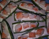 A picture of step 2 of Texas Crabb an Cream Cheese jalapenos wrapped in Bacon.