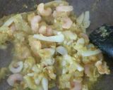 A picture of step 5 of Arroz Negro with Aioli.