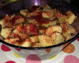 Foto del paso 3 de la receta: Patatas especiadas al horno con huevo y virutas de jamón