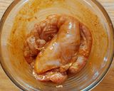 A picture of step 2 of Chicken with Potatoes and Bell Pepper in the Air Fryer.