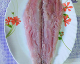 Foto del paso 3 de la receta: Merluza con hojaldre rellena de gambas y pimientos del piquillo