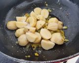 A picture of step 2 of Aloo palakh.