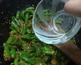A picture of step 6 of Green chilli pickle.