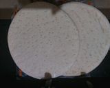 A picture of step 2 of Tawa pizza.