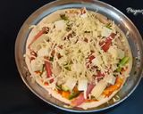 A picture of step 5 of Babycorn Pizza in Kadai.