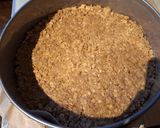 A picture of step 1 of White Chocolate and Red Berry Cheesecake.