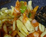 A picture of step 4 of Honey chilli potatoes.