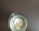 A picture of step 7 of Indian frozen dessert mango bar(popsicle) with curd.