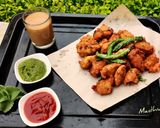 भुट्टे की पकौड़ी /कॉर्न फ्रिटर्स (Bhutte ki pakodi/ corn fritters recipe in Hindi) रेसिपी चरण 6 फोटो