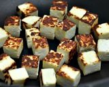 A picture of step 12 of Palak Paneer (cottage cheese cubes in spinach).