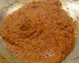 A picture of step 2 of Spicy asian chicken rendang.
