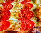 A picture of step 5 of Quick Caprese Puff Pastry Pizza with Basil Pesto by TastyPinch.