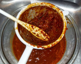 A picture of step 7 of Pollo Posole Rojo.
