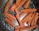 A picture of step 4 of Pan roasted carrot sticks stove top.