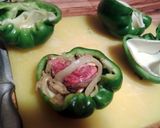 A picture of step 5 of Philly cheesesteak stuffed bell peppers.