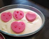 A picture of step 6 of Strawberry jello pudding.