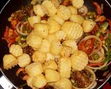 A picture of step 6 of Veggies fried irish potatoe.