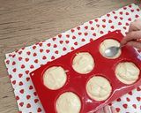 Foto del paso 4 de la receta: Muffins rellenos de crema de cacao y naranjas escarchada