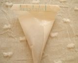 A picture of step 13 of Petite Chocolate Piping Cone.