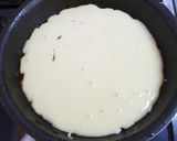 A picture of step 7 of Pancake Mix Cinnamon Apple Cake in a Frying Pan.