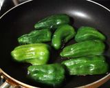 A picture of step 6 of Green Peppers Stuffed with Meat and Topped with Melted Cheese.