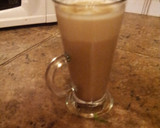 A picture of step 13 of A 'latte' the old fashioned way with smooth caramel sauce and hand made white chocolate chunks.