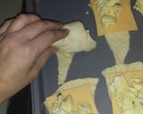 A picture of step 5 of Buttery croissant filled with green onion egg and cheese mixture.