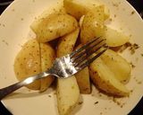 A picture of step 4 of Oregano Greek Lemon Potatoes.