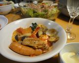 A picture of step 8 of Our Family's Bouillabaisse-style Tomato Hot Pot.