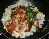 A picture of step 16 of Shrimp, Egg and Pea fried rice.