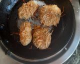 A picture of step 7 of Cheesy Noodles with Dumplings.
